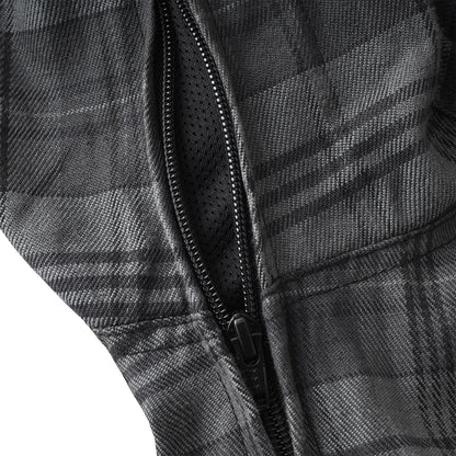 Close-up of a black and gray plaid zippered jacket showing the textured fabric, zipper track, and black mesh lining.